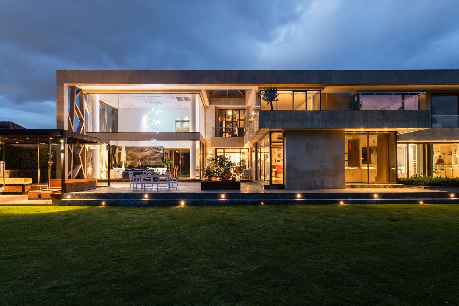 Modern villa exterior at dusk photograph