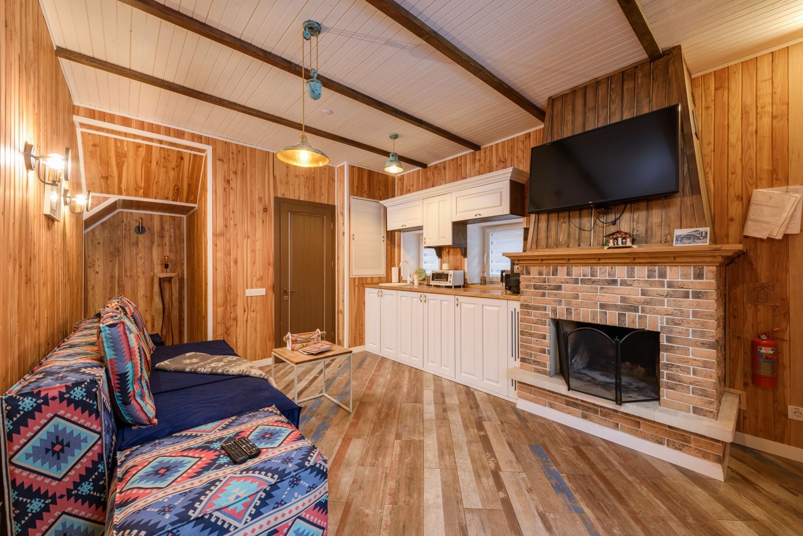 Warm living room with wooden walls photograph